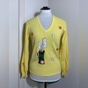 Whimsical Yellow V-Neck Sweater with Garden Motif